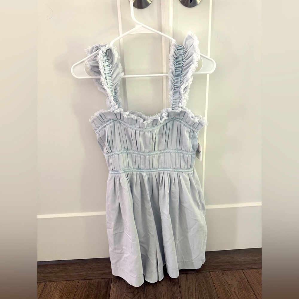 NEW WITH TAGS Altar’d State Ashley Light Blue Denim Ruffled Romper - Size XS